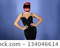 Elegant beautiful girl in black slinky dress posing 134046614