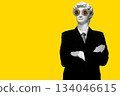 Abstract modern collage. The man with the plaster head of David Smiling businessman standing with arms folded with bitcoin eyes isolated on yellow background 134046615
