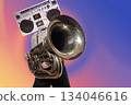 Abstract modern collage. The man with the head of a tape recorder holding the tube 134046616