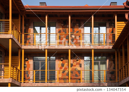 Yerevan Armenia 10.25.2025. A building with a lot of windows and a balcony Yerevan Armenia 10.25.2025. A building with a lot of windows and a balcony 134047354