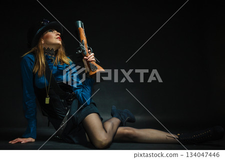 Steampunk girl armed and dangerous. 134047446