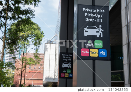 Singapore, Singapore - May 01, 2025: Private hire pick-up/drop-off sign in Orchard Road, Singapore 134048263