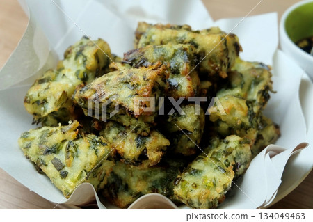 Homemade Fried Thai Chive Cakes and Dipping Sauce Homemade Fried Thai Chive Cakes and Dipping Sauce 134049463