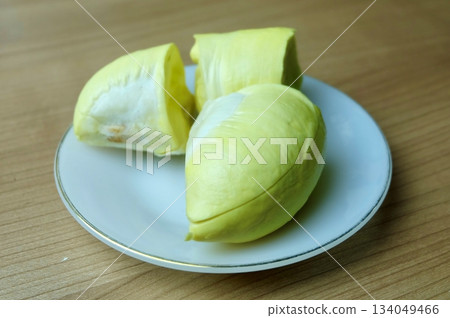 Rich Creamy Durian Pulp on White Plate Rich Creamy Durian Pulp on White Plate 134049466