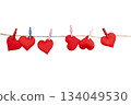 Display of Red Hearts on a Line With Clips for Valentine's Day Decoration Ideas 134049530