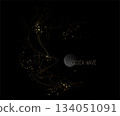 An isolated gold wavy circular frame made of fine tinsel on a black background 134051091