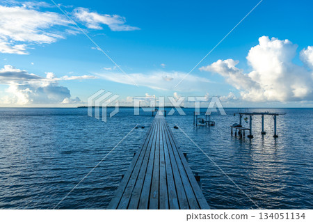 Sunset over the tranquil lagoon of Maupiti, French Polynesia Sunset over the tranquil lagoon of Maupiti, French Polynesia 134051134