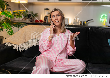 Adult woman angry smartphone call argues frowns sharp gesture rejects offer blocks spam scam caller 134051207