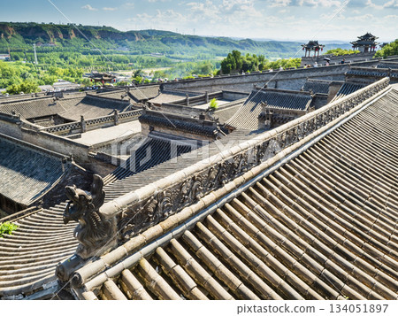 Chinese tiled roofs at the historic Wang Family Courtyard near Pingyao, Shanxi Province, China Chinese tiled roofs at the historic Wang Family Courtyard near Pingyao, Shanxi Province, China 134051897