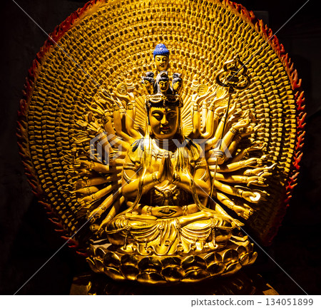 Guishan Guanyin of the Thousand Hands and Eyes, a golden statue in Fubo Hill, Guilin, China 134051899