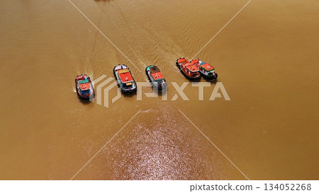 River Boats Aerial View Waterway Transport Thai River from Above flood River Boats Aerial View Waterway Transport Thai River from Above flood 134052268
