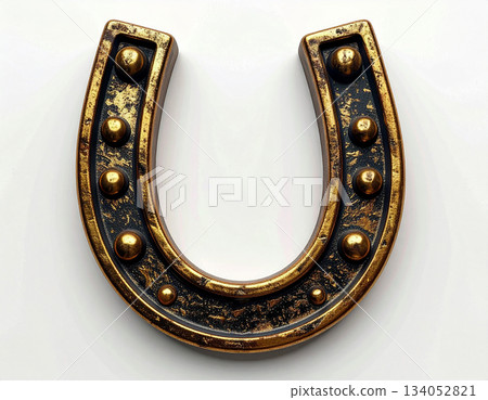 Talisman of success. Metal horse shoe on white background. Horse is symbol of 2026. Symbol of lucky. 134052821
