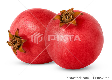 Ripe fresh pomegranate isolated. Two red pomegranates isolate. Ripe fresh pomegranate isolated. Two red pomegranates isolate. 134052936
