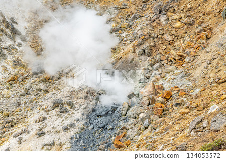 Steam erupting from the ground Steam erupting from the ground 134053572