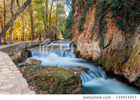 Monasterio de Piedra river cascades flowing through autumn landscape 134054053