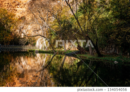 Monasterio de Piedra autumn landscape reflecting in lake 134054056