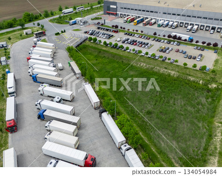 Truck parking at the logistics center. Aerial view. Truck parking at the logistics center. Aerial view. 134054984