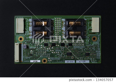 Computer parts and board on a black background Computer parts and board on a black background 134057057