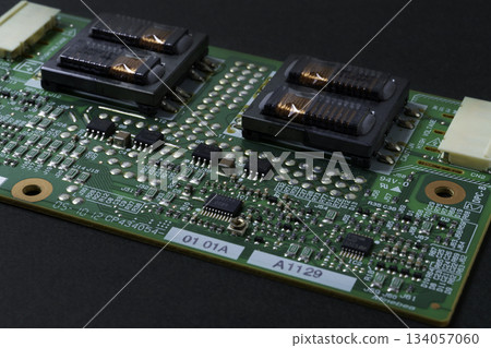 Computer parts and board on a black background 134057060