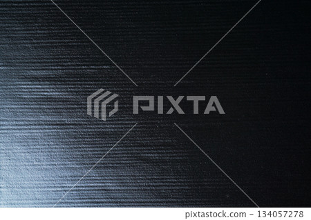Texture of black ceramic plate with horizontal stripes 134057278