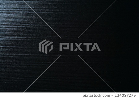 Texture of black ceramic plate with horizontal stripes 134057279