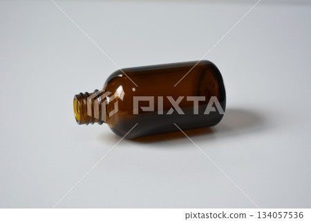 Fallen brown medicine bottle Fallen brown medicine bottle 134057536