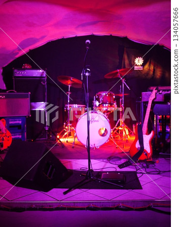 Stage with a microphone and drum set Stage with a microphone and drum set 134057666