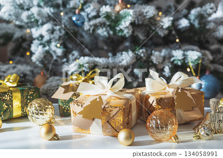 Christmas Gifts in Festive Interior under Sun Light Christmas Gifts in Festive Interior under Sun Light 134058991