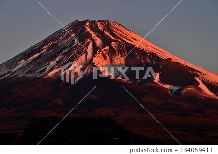 Mount Fuji and the Hoei crater bathed in the morning sun from the Torigoki Plateau Observatory on Mount Echizen in the Aitaka Mountains Mount Fuji and the Hoei crater bathed in the morning sun from the Torigoki Plateau Observatory on Mount Echizen in the Aitaka Mountains 134059411