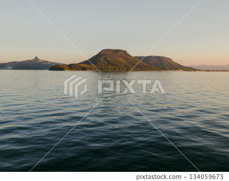 Yashima and the sea seen from a ferry in the evening, Seto Inland Sea, Kagawa Prefecture Yashima and the sea seen from a ferry in the evening, Seto Inland Sea, Kagawa Prefecture 134059673