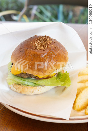 Delicious hamburger and french fries Delicious hamburger and french fries 134060019