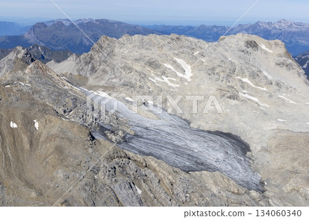 View from Schesaplana summit overlooking Brandner glacier in Ratikon mountain range, Vorarlberg, Austria during a hiking adventure View from Schesaplana summit overlooking Brandner glacier in Ratikon mountain range, Vorarlberg, Austria during a hiking adventure 134060340