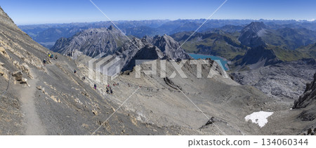 View from Schesaplana mountain showing Lunersee lake in Ratikon mountain range in Vorarlberg, Austria during a clear day View from Schesaplana mountain showing Lunersee lake in Ratikon mountain range in Vorarlberg, Austria during a clear day 134060344