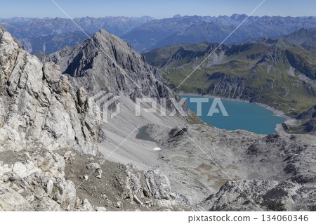 View from Schesaplana mountain showing Lunersee lake and Seekopf mountain in Ratikon mountain range in Vorarlberg, Austria View from Schesaplana mountain showing Lunersee lake and Seekopf mountain in Ratikon mountain range in Vorarlberg, Austria 134060346