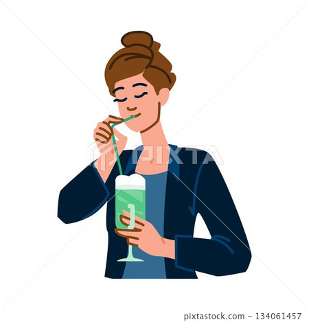 Woman enjoying refreshing green beverage through straw 134061457
