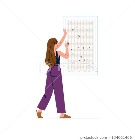 Woman planning strategy on a pinboard with location pins Woman planning strategy on a pinboard with location pins 134061466