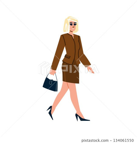 Businesswoman walking with handbag wearing suit and heels 134061550