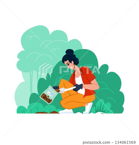 Woman gardening outdoors planting seeds in soil Woman gardening outdoors planting seeds in soil 134061569