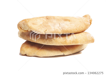 Pies with cabbage (pirozhki) isolated on white. Homemade baking 134062275