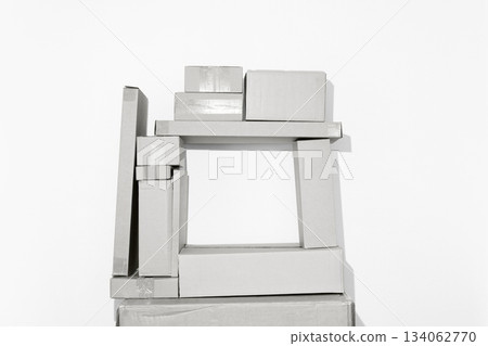 Frame of Cardboard Boxes in Minimalist Setting color of the year 2026 cloud white dancer 134062770