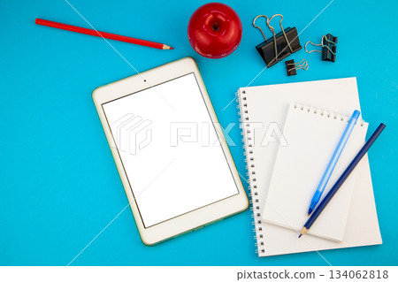 Tablet mockup background top view. Workplace copy space. otepad, notebook and pen. Study and work. Planning. Self-learning. Online course. Education remotely. Tablet mockup background top view. Workplace copy space. otepad, notebook and pen. Study and work. Planning. Self-learning. Online course. Education remotely. 134062818