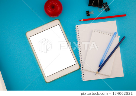 Tablet mockup background top view. Workplace copy space. otepad, notebook and pen. Study and work. Planning. Self-learning. Online course. Education remotely. Tablet mockup background top view. Workplace copy space. otepad, notebook and pen. Study and work. Planning. Self-learning. Online course. Education remotely. 134062821
