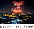 Top view of Chao Phraya River Cruise Boat with The Grand Palace and The Emerald Buddha Temple, Chakri Maha Prasat Throne Hall in New year firework festival performance. 134065366