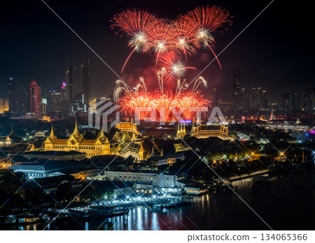 Top view of Chao Phraya River Cruise Boat with The Grand Palace and The Emerald Buddha Temple, Chakri Maha Prasat Throne Hall in New year firework festival performance. Top view of Chao Phraya River Cruise Boat with The Grand Palace and The Emerald Buddha Temple, Chakri Maha Prasat Throne Hall in New year firework festival performance. 134065366