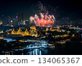 Top view of the Grand Palace, Chakri Maha Prasat Throne Hall in the New Year fireworks drone show and projection mapping during the Vijit Chao Phraya festival perfermance. 134065367