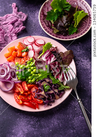 Ketogenic bowl with vegetables and salmon 134065759