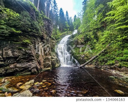 Mountain Symphony The Power and Grace of a Waterfall 134066163