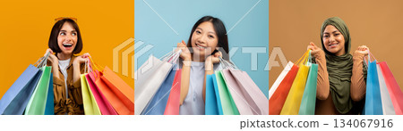 Three excited individuals display their shopping bags, representing a diverse range of styles. They celebrate the thrill of discovering deals during a popular sale. 134067916