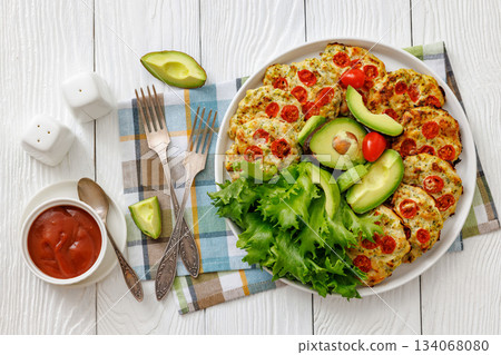 minced chicken cherry tomatoes patties on a plate minced chicken cherry tomatoes patties on a plate 134068080