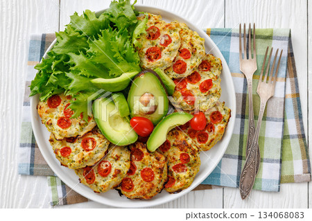 minced chicken cherry tomatoes patties on a plate minced chicken cherry tomatoes patties on a plate 134068083